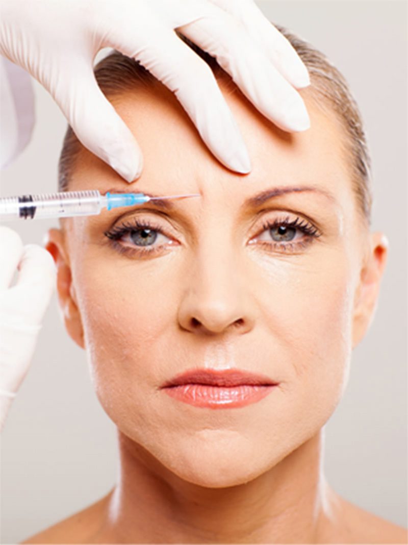 Anti wrinkle treatment being performed on forehead