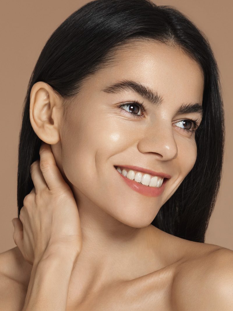 Woman with glowing, smooth skin